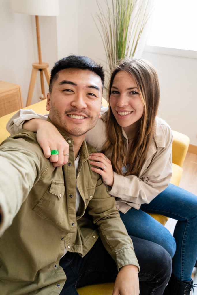 young-couple-taking-selfie-in-their-new-home